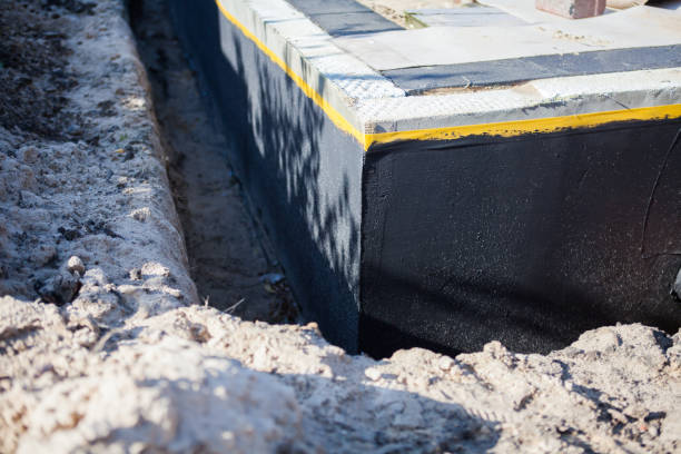 Professional Waterproofing technician working in Prospect Heights, IL